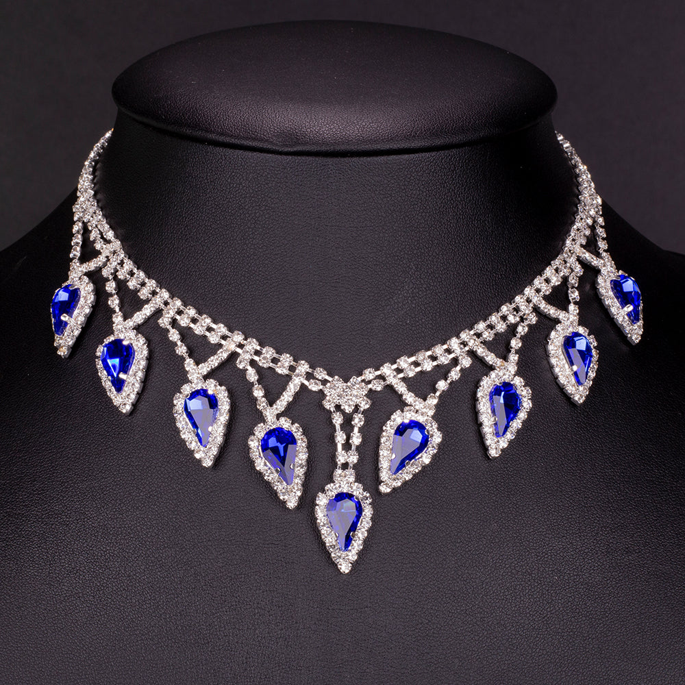 Kullattu TeräsSetti Sinisellä Emporia® Kristallilla ja Valkoisella Emporia® Kristallilla ( Kaulakoru+Korvakorut )