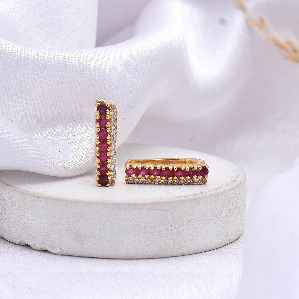 Kullatut hopeat Korvakorut Malagassin Rubiinilla ja Valkoisella Topaasilla