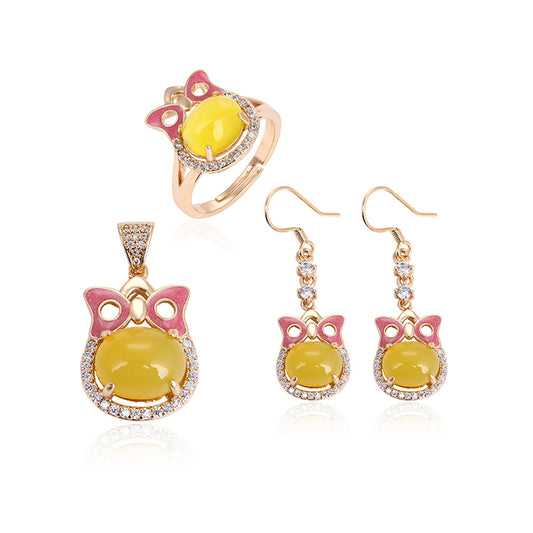 Kullattu TerÀsSetti Keltaisella EmporiaŸ Kristallilla ja Valkoisella EmporiaŸ Kristallilla ( Korvakorut+Sormus+Riipus )