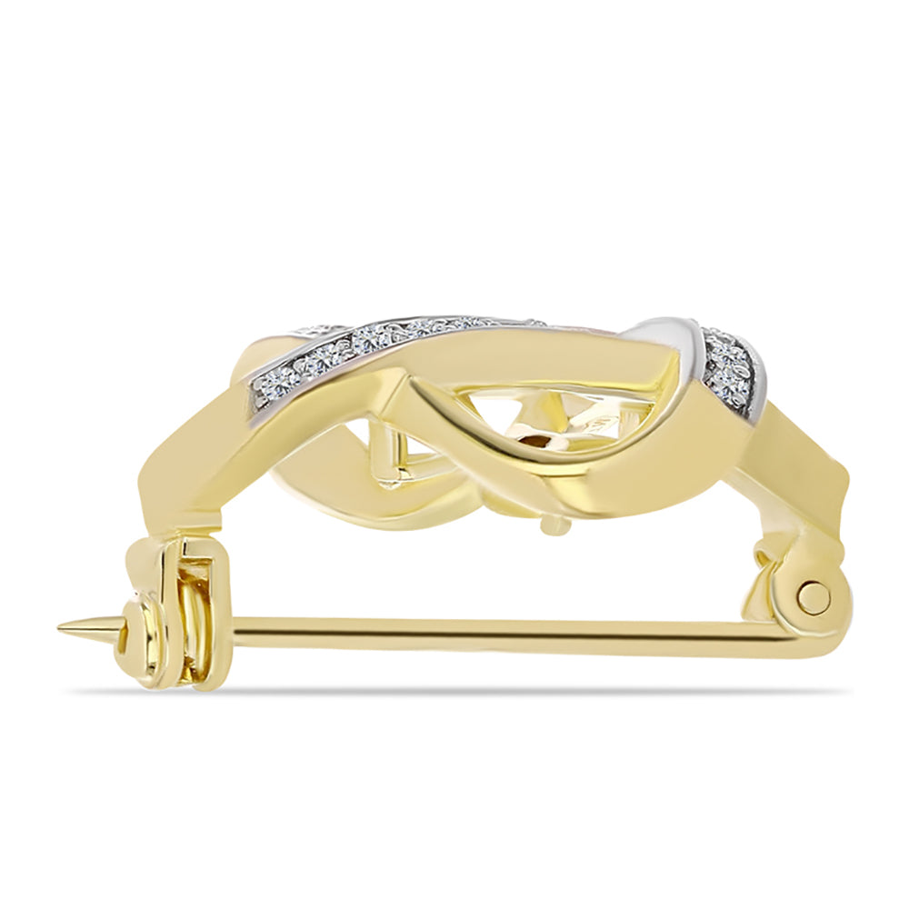 Kullattu hopeaRintaneula Konjakin Värisellä Timantilla ja Valkoisella Topaasilla