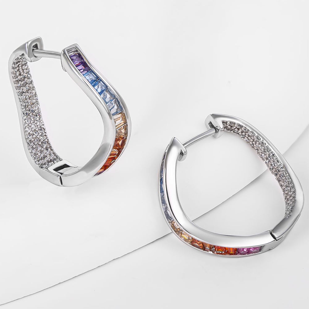 Kullattu TeräsKorvakorut Sinisellä Emporia® Kristallilla ja Punaisella Emporia® Kristallilla