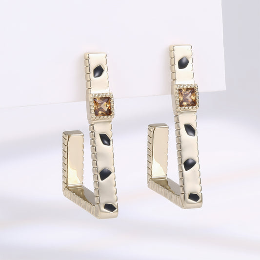 Kullattu TeräsKorvakorut Ruskealla Emporia® Kristallilla