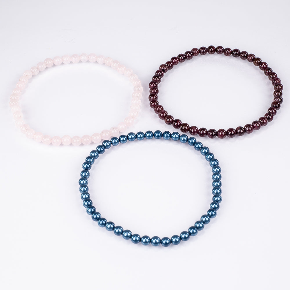 Setti Ruusukvartsilla ja Punaisella Granaatilla ( Rannekoru )