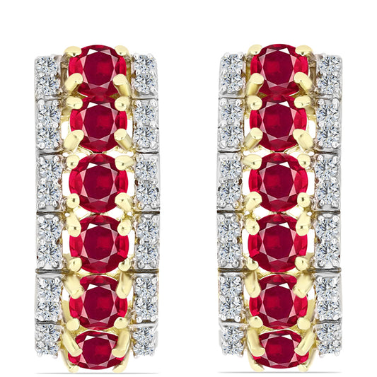 Kullatut hopeat Korvakorut Malagassin Rubiinilla ja Valkoisella Topaasilla