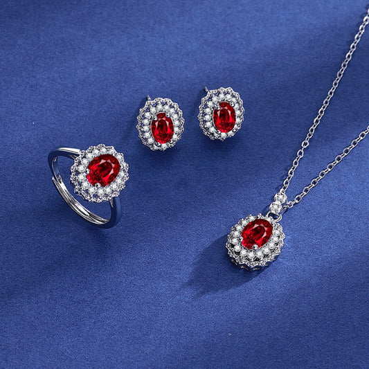 Kullattu TeräsSetti Punaisella Emporia® Kristallilla ja Valkoisella Emporia® Kristallilla ( Kaulakoru+Korvakorut+Sormus )