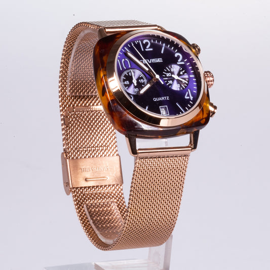 yellow gold colour strap and case, blue dial, stainless steel watch with stopper