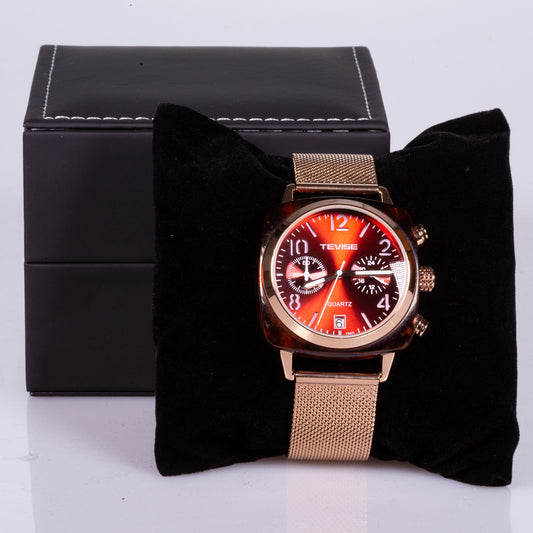 yellow gold colour strap and case, red dial, stainless steel watch with stopper